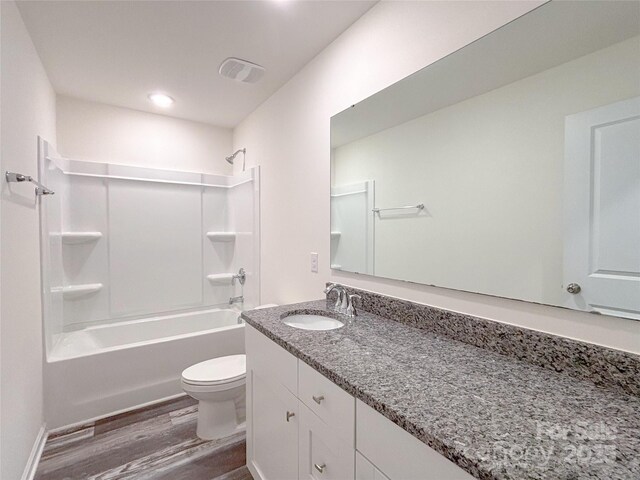 1542 Antioch Dr, Conover, NC 28613 - bathroom with wood finished floors, vanity, shower / bathtub combination, and recessed lighting