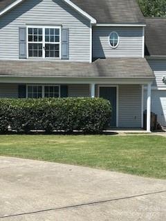 1422 Mitchell Glen St, Kannapolis, NC 28083 - view of front of house featuring a front lawn