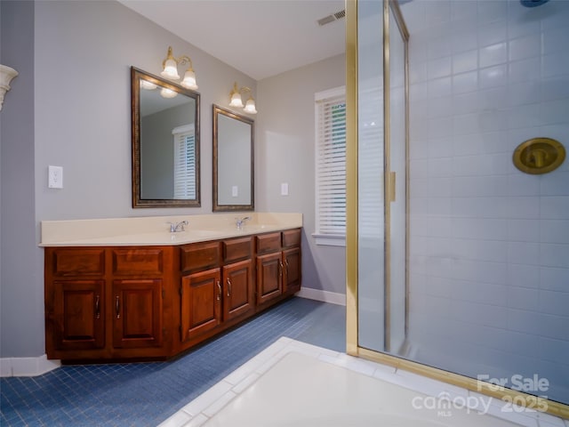 6620 Amos Smith Rd, Charlotte, NC 28214 - full bath with double vanity and a tile shower