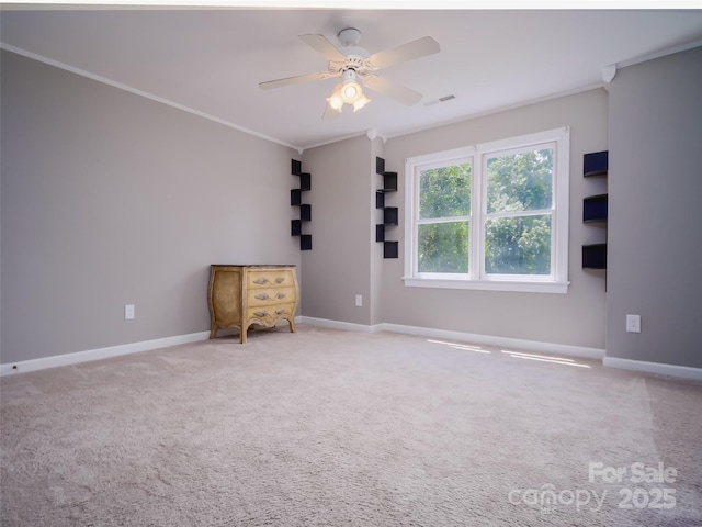 6620 Amos Smith Rd, Charlotte, NC 28214 - empty room featuring ornamental molding, ceiling fan, and carpet