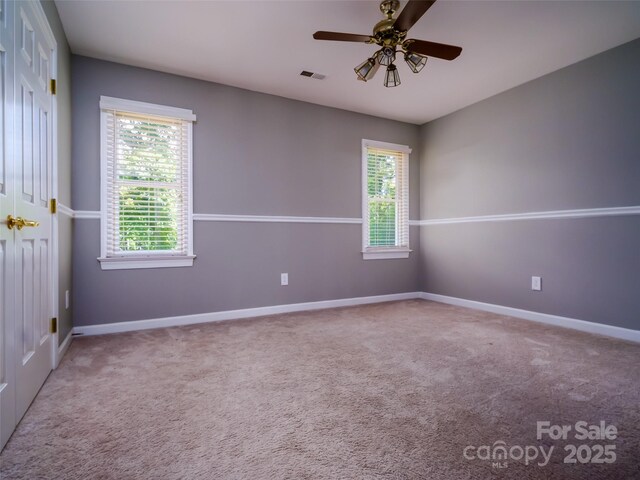 6620 Amos Smith Rd, Charlotte, NC 28214 - empty room with ceiling fan and carpet flooring