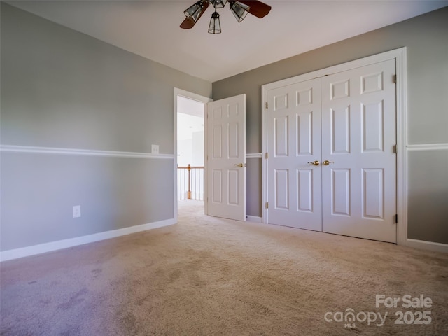 6620 Amos Smith Rd, Charlotte, NC 28214 - unfurnished bedroom with carpet floors, a closet, and ceiling fan