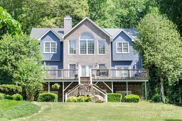 6620 Amos Smith Rd, Charlotte, NC 28214 - rear view of house with stairs, a deck, a standing seam roof, and a metal roof