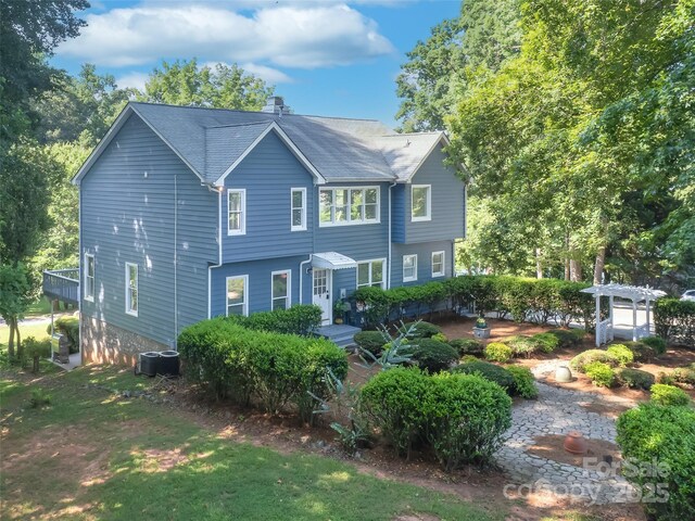 6620 Amos Smith Rd, Charlotte, NC 28214 - view of front of home with a chimney