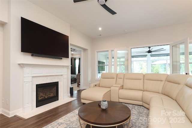 10240 Superb Ln, Charlotte, NC 28215 - living room featuring a ceiling fan, a fireplace, dark wood finished floors, and recessed lighting