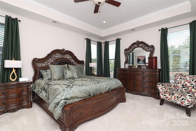 10240 Superb Ln, Charlotte, NC 28215 - bedroom with light carpet, crown molding, a tray ceiling, and a ceiling fan