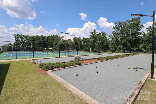 10240 Superb Ln, Charlotte, NC 28215 - view of tennis court featuring a bocce ball area and view of wooded area
