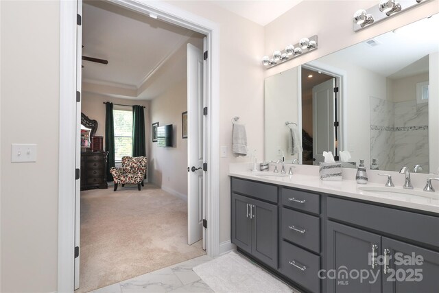 10240 Superb Ln, Charlotte, NC 28215 - bathroom featuring double vanity, marble finish flooring, and a shower