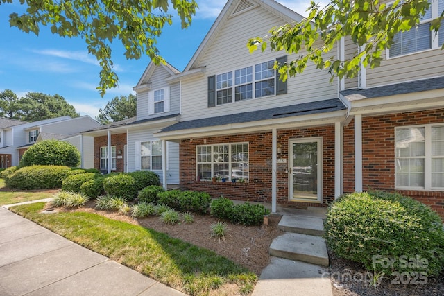 1778 Pergola Pl, Charlotte, NC 28213 - view of front of property featuring brick siding and a shingled roof