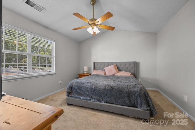 1778 Pergola Pl, Charlotte, NC 28213 - bedroom featuring carpet floors, vaulted ceiling, a ceiling fan, and a textured ceiling