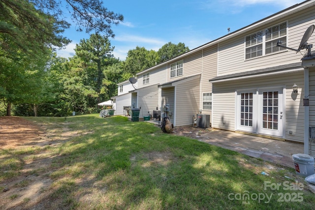 1778 Pergola Pl, Charlotte, NC 28213 - rear view of property featuring a lawn and a patio area