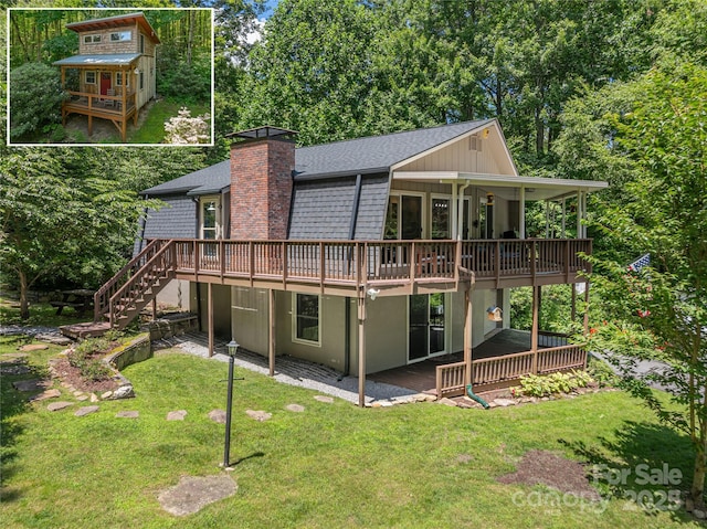 477 Locust Dr, Maggie Valley, NC 28751 - rear view of property with a yard, a chimney, a deck, and a shingled roof