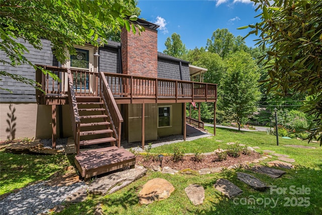 477 Locust Dr, Maggie Valley, NC 28751 - rear view of property with a wooden deck, a lawn, a chimney, and stairway