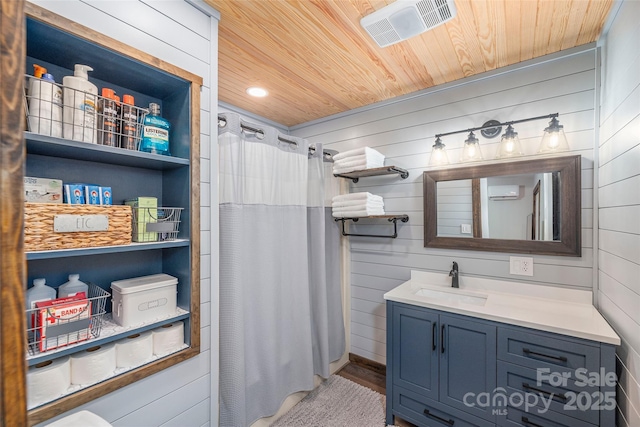 477 Locust Dr, Maggie Valley, NC 28751 - full bathroom with wood ceiling, vanity, wooden walls, curtained shower, and wood finished floors