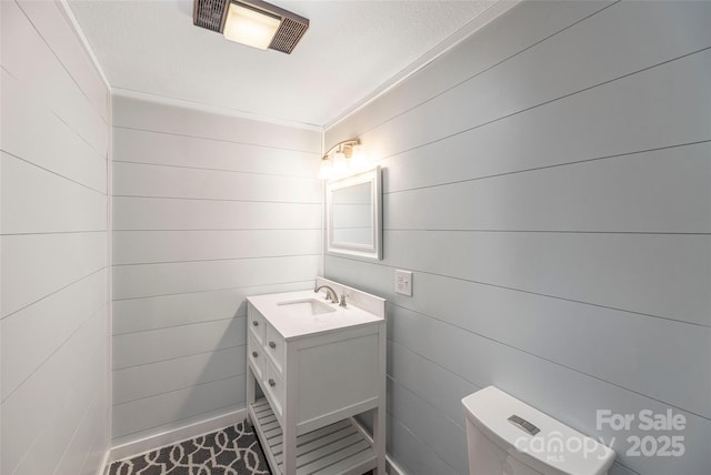 477 Locust Dr, Maggie Valley, NC 28751 - half bath with vanity and wooden walls