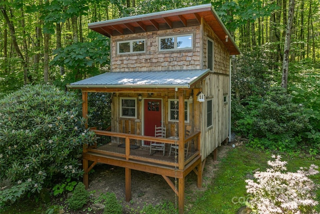 477 Locust Dr, Maggie Valley, NC 28751 - view of outdoor structure featuring a wooded view