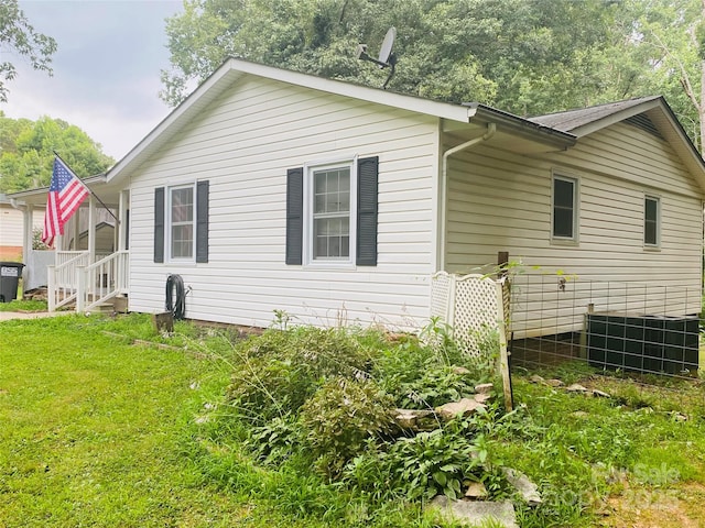 140 Hillside Dr, Salisbury, NC 28147 - view of home's exterior with a cooling unit and a yard