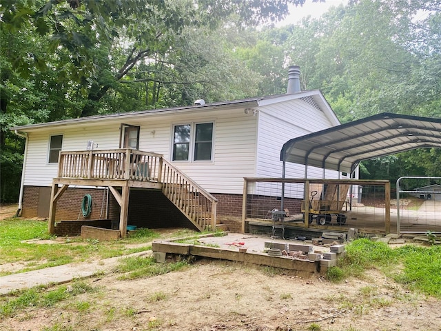140 Hillside Dr, Salisbury, NC 28147 - rear view of house with a wooden deck, stairs, and a detached carport