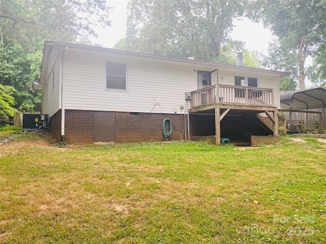 140 Hillside Dr, Salisbury, NC 28147 - rear view of property with a yard, a wooden deck, a carport, and crawl space