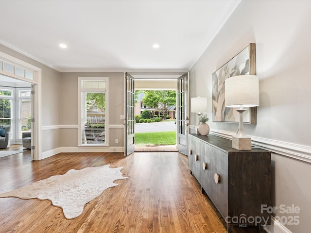 2103 Lytton Ln, Matthews, NC 28104 - foyer featuring ornamental molding, wood finished floors, and recessed lighting