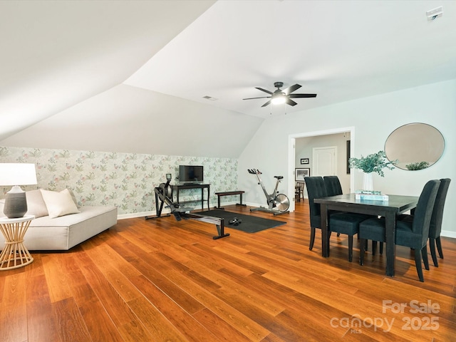 2103 Lytton Ln, Matthews, NC 28104 - exercise area with wallpapered walls, wood finished floors, a ceiling fan, and lofted ceiling