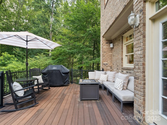 2103 Lytton Ln, Matthews, NC 28104 - wooden deck with a grill and an outdoor living space with a fire pit