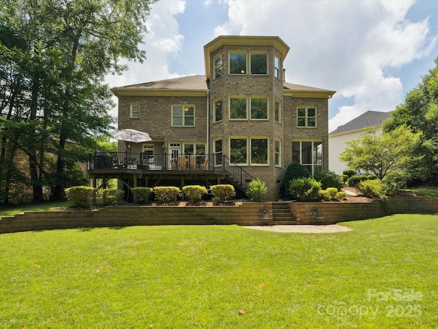 2103 Lytton Ln, Matthews, NC 28104 - back of house featuring a wooden deck, stairway, a lawn, and brick siding