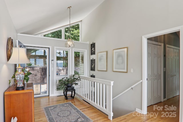 600 Summit Rdg Unit 34, Waynesville, NC 28786 - foyer with wood finished floors and high vaulted ceiling