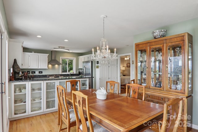600 Summit Rdg Unit 34, Waynesville, NC 28786 - dining space with a chandelier, light wood-style flooring, and recessed lighting