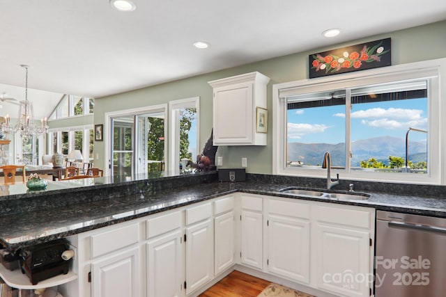 600 Summit Rdg Unit 34, Waynesville, NC 28786 - kitchen featuring stainless steel dishwasher, open shelves, white cabinetry, dark stone counters, and recessed lighting