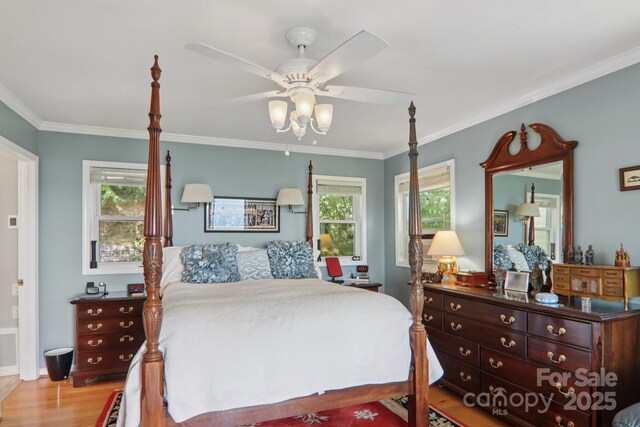 600 Summit Rdg Unit 34, Waynesville, NC 28786 - bedroom with ornamental molding, wood finished floors, and ceiling fan
