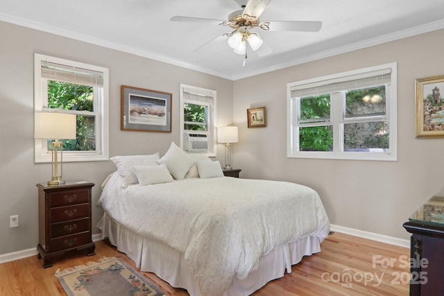 600 Summit Rdg Unit 34, Waynesville, NC 28786 - bedroom featuring light wood-style flooring, ornamental molding, ceiling fan, and cooling unit