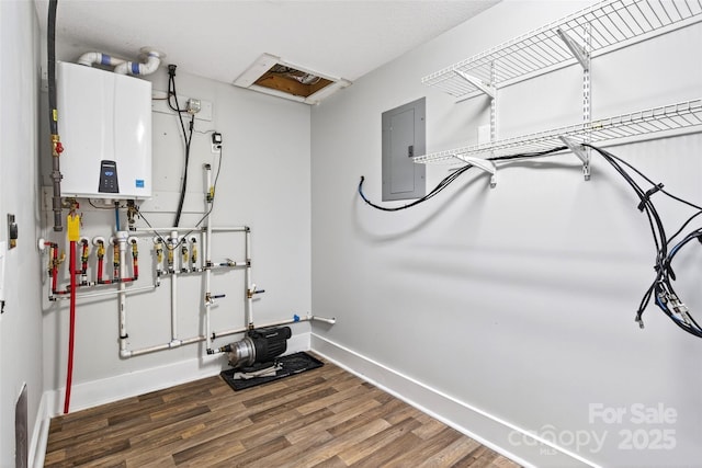 4 Stars Forever Dr, Black Mountain, NC 28711 - workout area with tankless water heater, electric panel, and wood finished floors