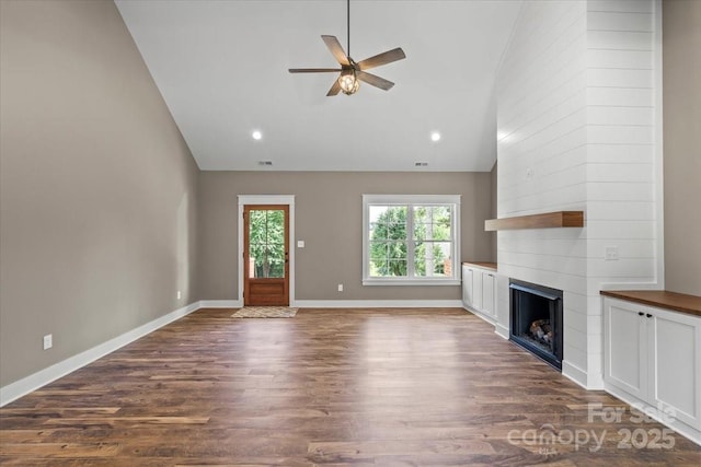 18 Morningside Dr, Granite Falls, NC 28630 - unfurnished living room with dark wood finished floors, a large fireplace, a ceiling fan, high vaulted ceiling, and recessed lighting
