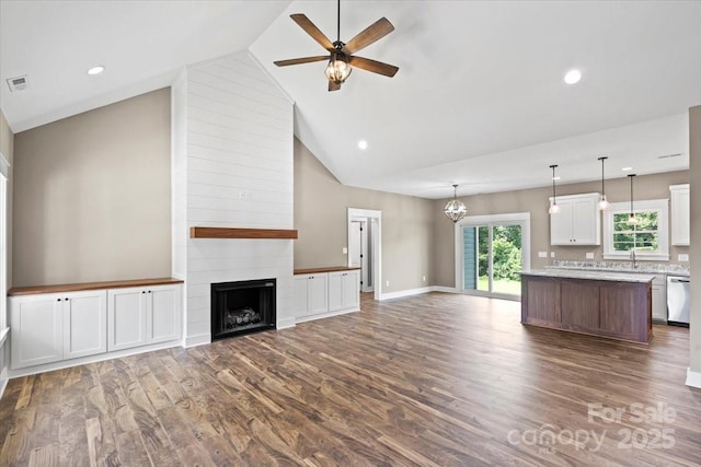 18 Morningside Dr, Granite Falls, NC 28630 - unfurnished living room featuring a ceiling fan, dark wood-style floors, a large fireplace, high vaulted ceiling, and recessed lighting