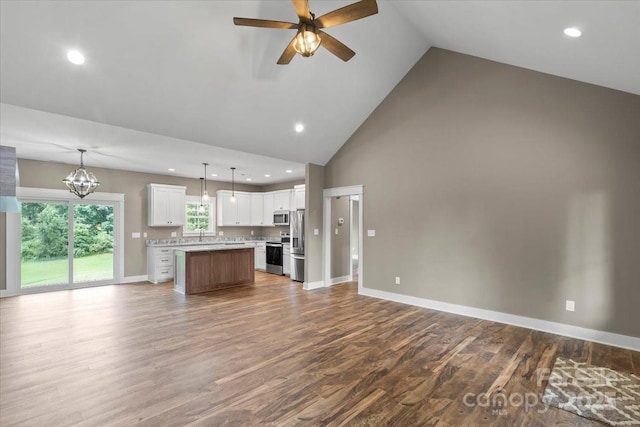 18 Morningside Dr, Granite Falls, NC 28630 - unfurnished living room with a ceiling fan, high vaulted ceiling, wood finished floors, a chandelier, and recessed lighting