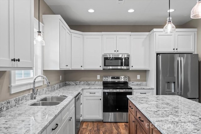 18 Morningside Dr, Granite Falls, NC 28630 - kitchen featuring stainless steel appliances, white cabinets, dark wood-style floors, decorative light fixtures, and recessed lighting