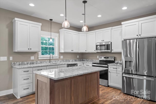 18 Morningside Dr, Granite Falls, NC 28630 - kitchen featuring appliances with stainless steel finishes, dark wood-type flooring, white cabinets, and recessed lighting