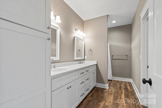 18 Morningside Dr, Granite Falls, NC 28630 - bathroom featuring double vanity, wood finished floors, and recessed lighting