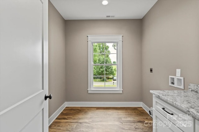 18 Morningside Dr, Granite Falls, NC 28630 - laundry area with hookup for an electric dryer, washer hookup, wood finished floors, and cabinet space