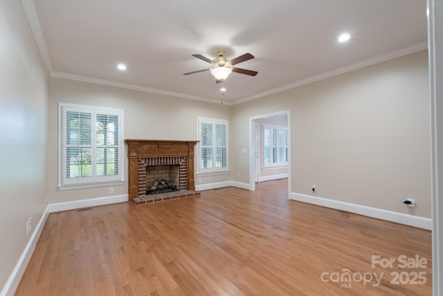 1503 Jack White Dr, Rock Hill, SC 29732 - unfurnished living room with ceiling fan, light wood finished floors, crown molding, a brick fireplace, and recessed lighting