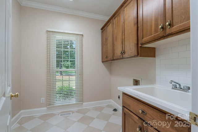 1503 Jack White Dr, Rock Hill, SC 29732 - laundry room featuring light floors, hookup for a washing machine, cabinet space, ornamental molding, and electric dryer hookup
