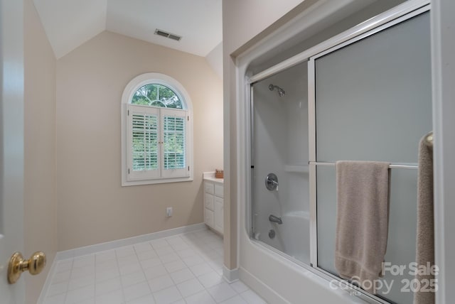 1503 Jack White Dr, Rock Hill, SC 29732 - bathroom featuring lofted ceiling, shower / bath combination with glass door, and tile patterned flooring