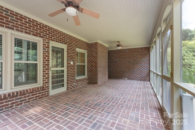 1503 Jack White Dr, Rock Hill, SC 29732 - unfurnished sunroom with a ceiling fan, brick floors, and brick wall