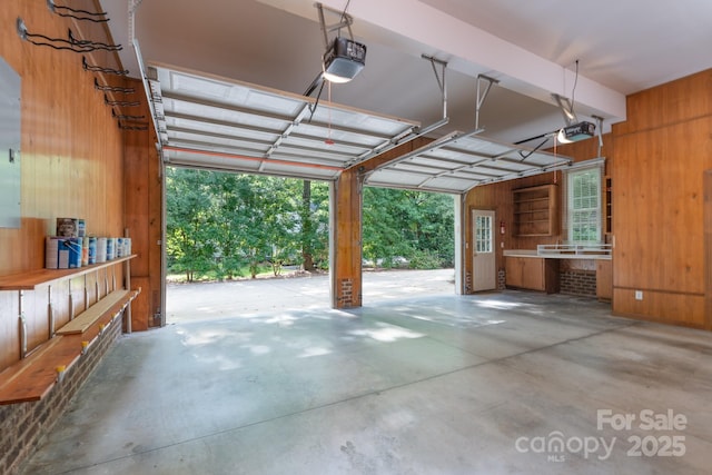 1503 Jack White Dr, Rock Hill, SC 29732 - garage featuring wood walls and a garage door opener