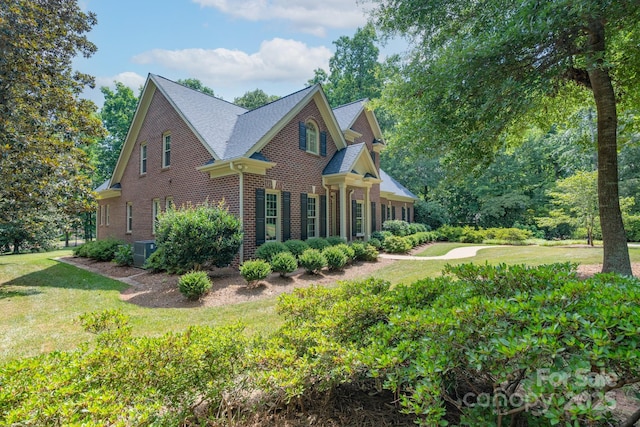 1503 Jack White Dr, Rock Hill, SC 29732 - view of front of home featuring brick siding, a front yard, and roof with shingles