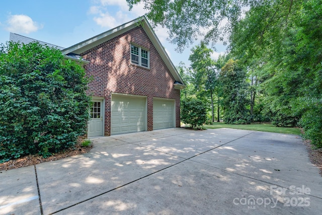 1503 Jack White Dr, Rock Hill, SC 29732 - view of property exterior with brick siding, concrete driveway, and an attached garage
