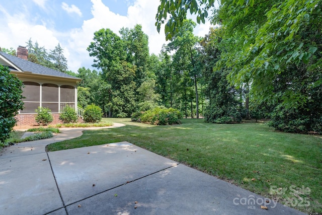 1503 Jack White Dr, Rock Hill, SC 29732 - view of grassy yard featuring a patio and a sunroom