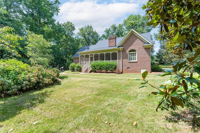 1503 Jack White Dr, Rock Hill, SC 29732 - back of property featuring brick siding, a sunroom, a chimney, and a yard