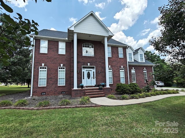 509 E Main St, Rockwell, NC 28138 - neoclassical / greek revival house with a front yard, brick siding, and roof with shingles
